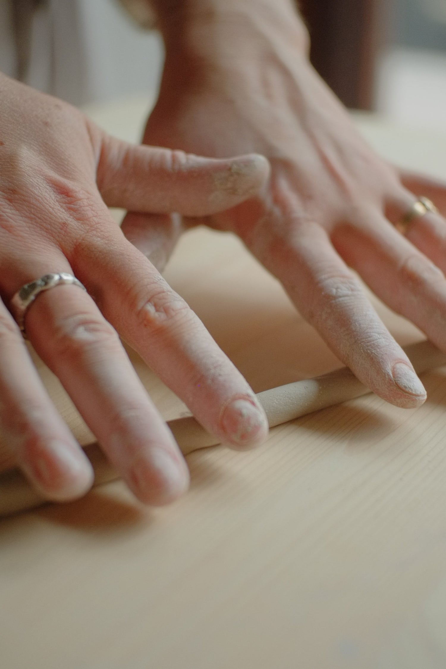Hands coil building ceramics 